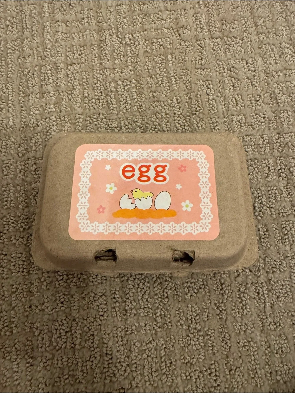 Amazon Beige Egg Carton with Pink Decorative Label